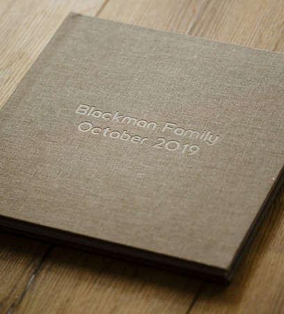 TAUPE Linen Book with DESSAU font in BLIND (no color) debossing